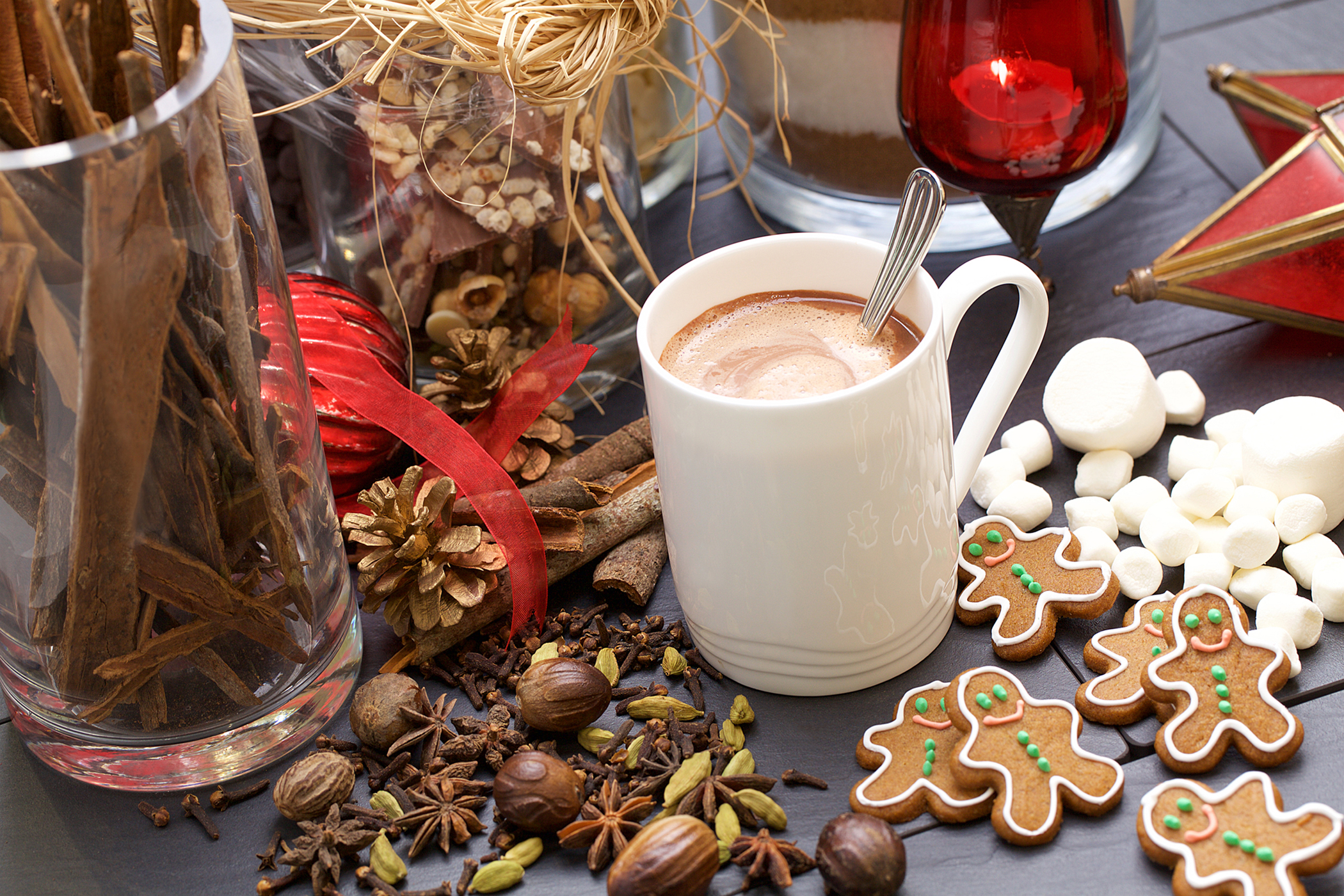 a cup of hot chocolate and gingerbread cookies